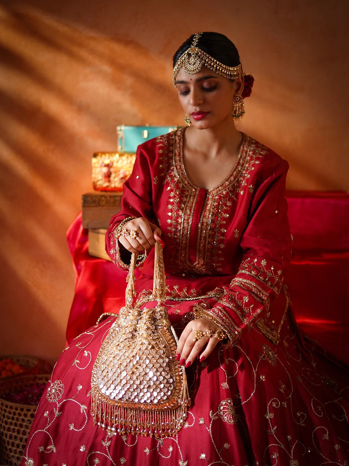 Aadhira Golden Sequin Potli Bag