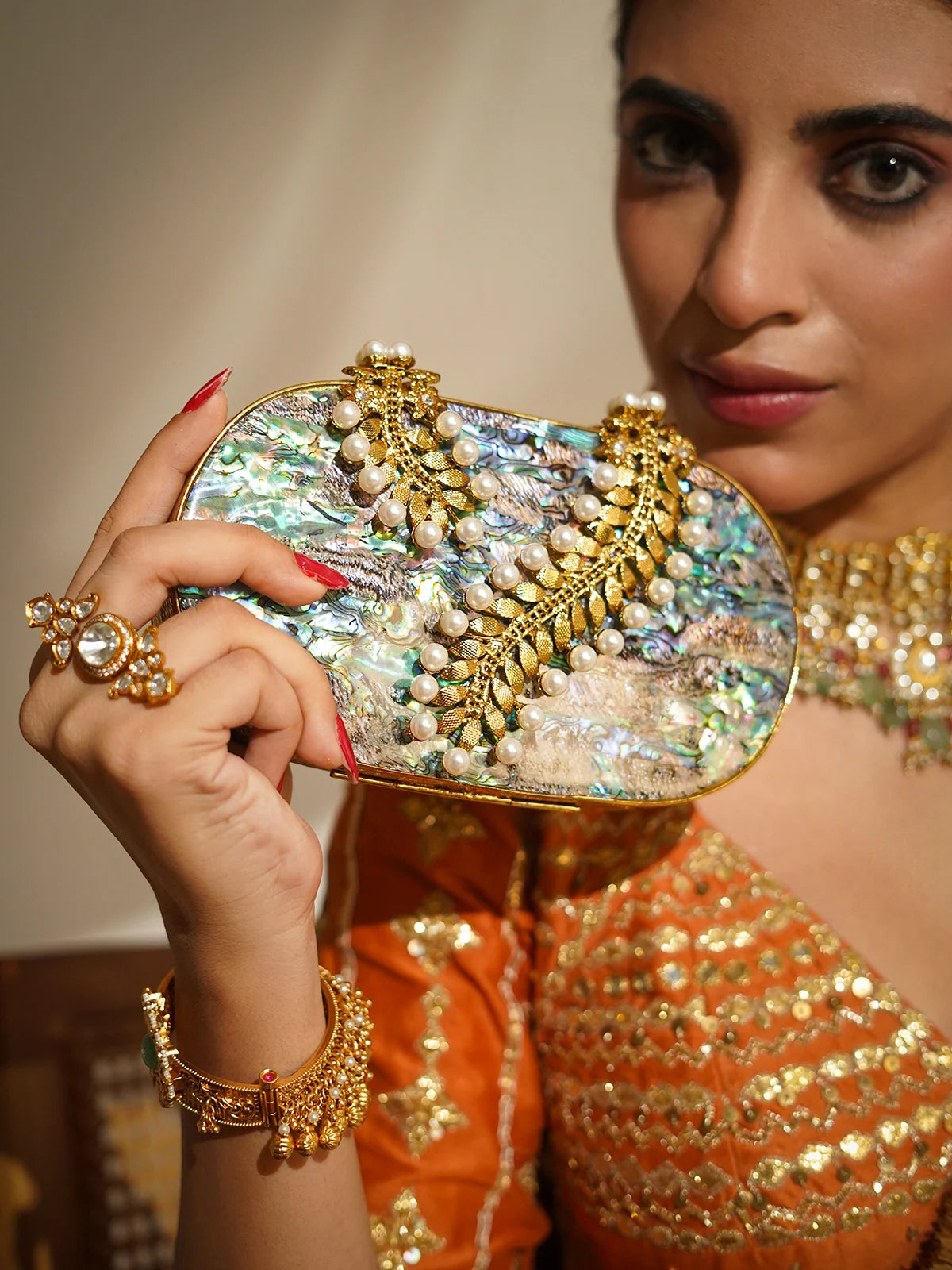 Mayurika Mother of Pearl Brass Clutch
