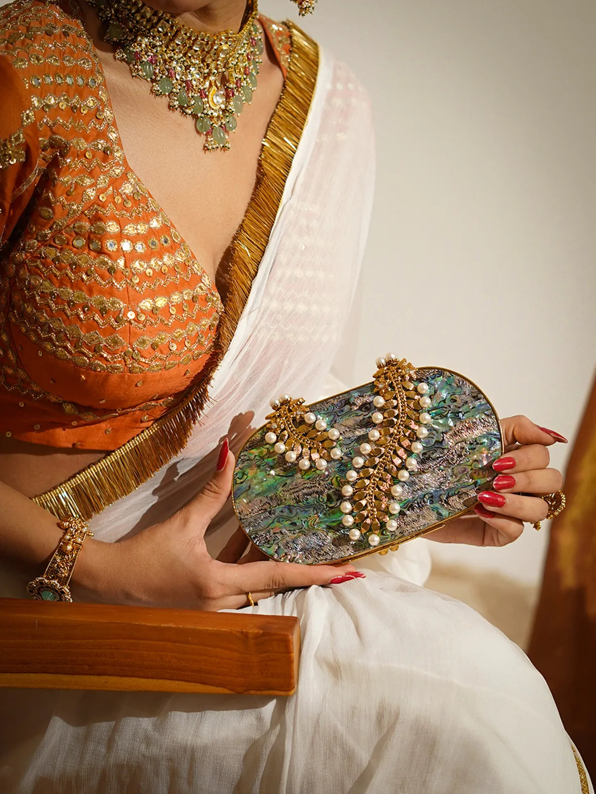Mayurika Mother of Pearl Brass Clutch