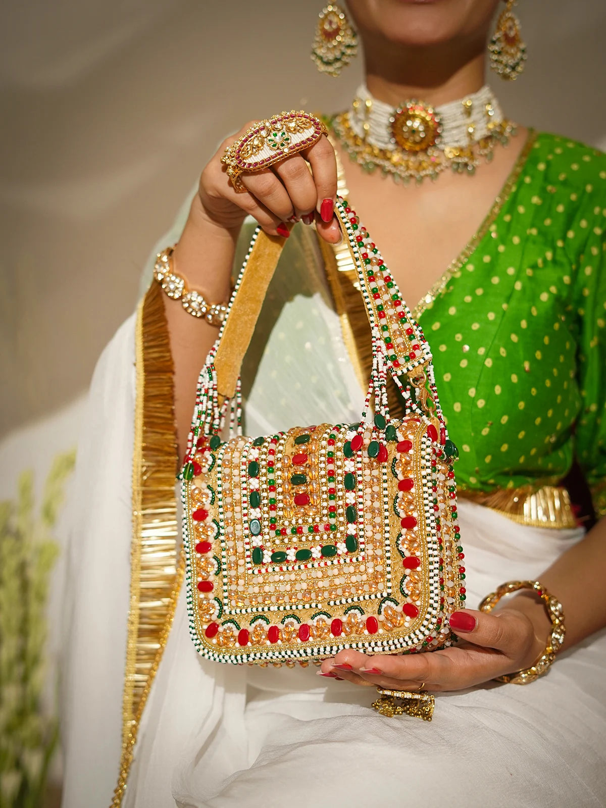 Rajkumari Golden Clutch Bag