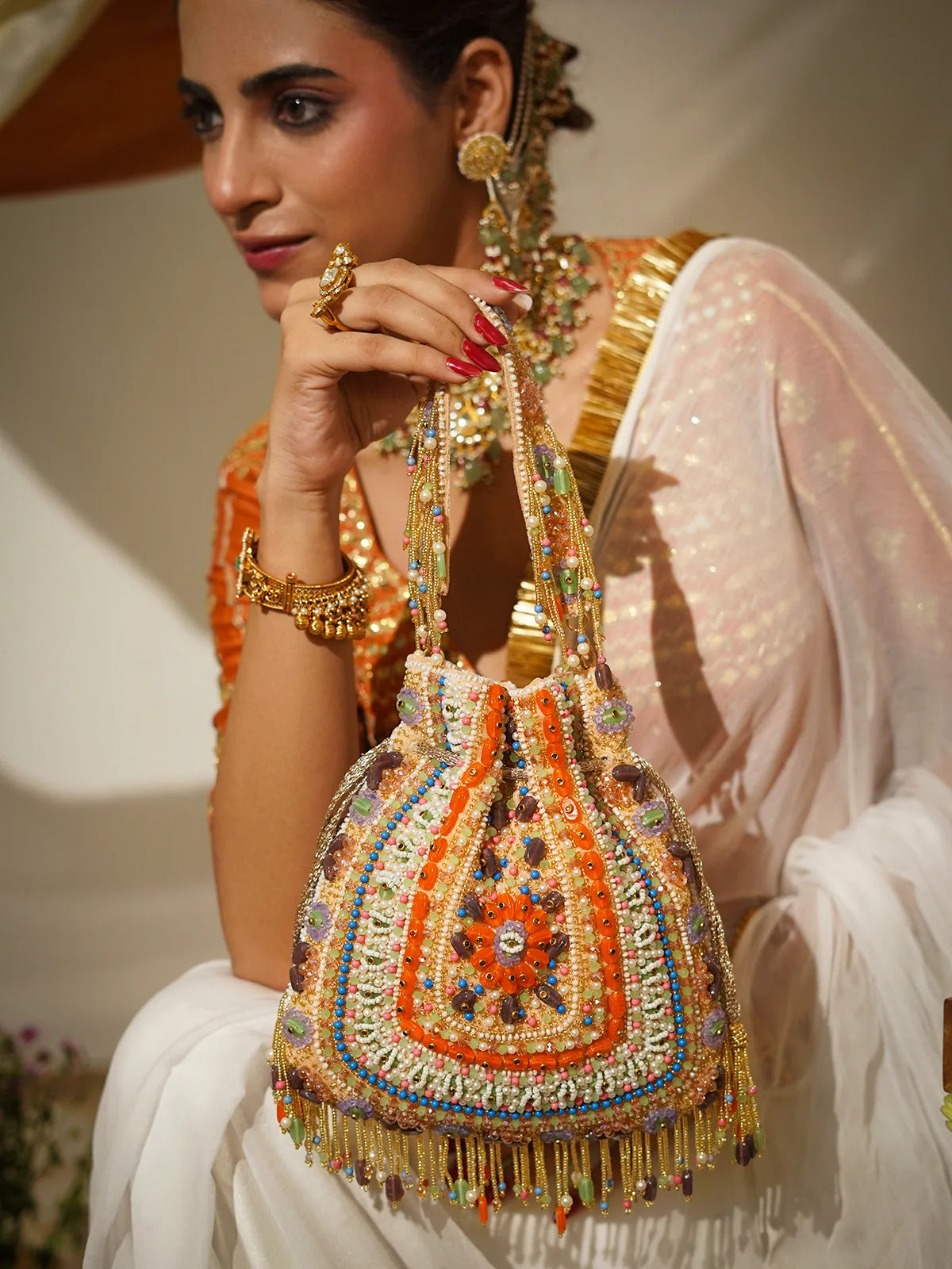 Rangmaya Peach Potli Bag