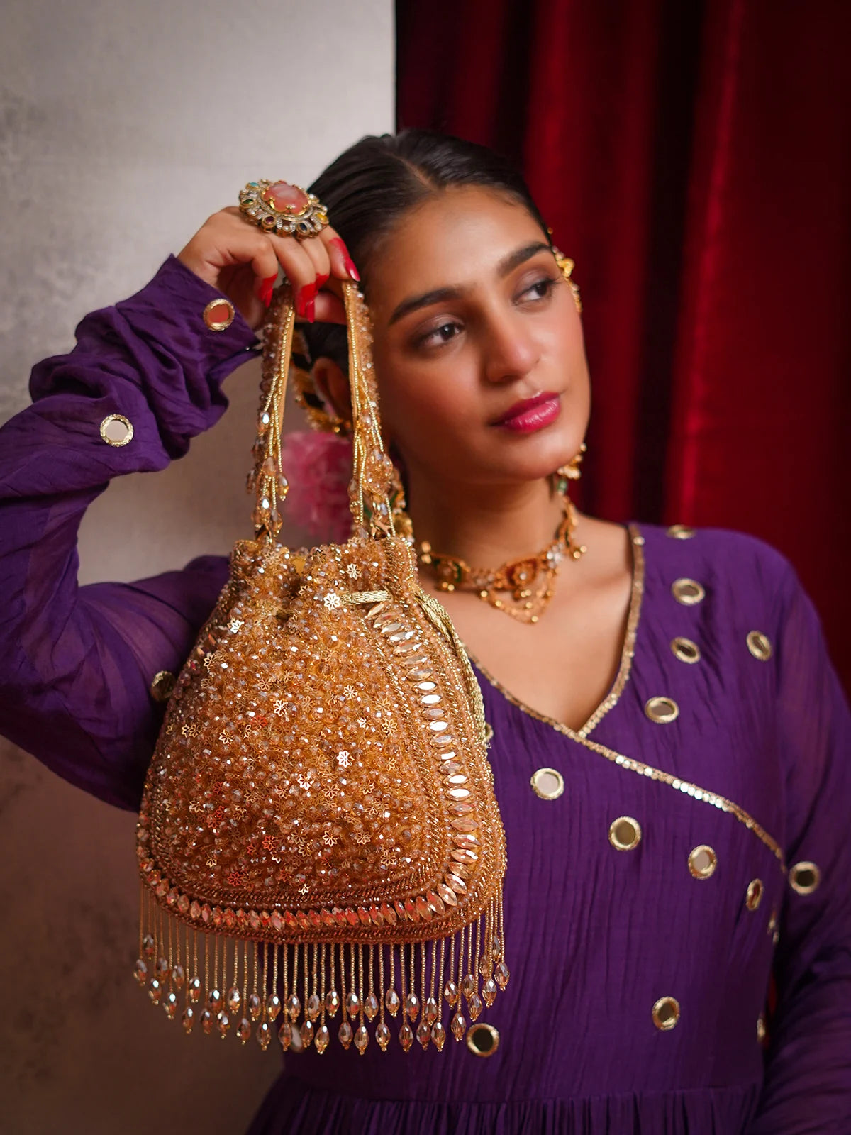 Tarini Golden Potli Bag