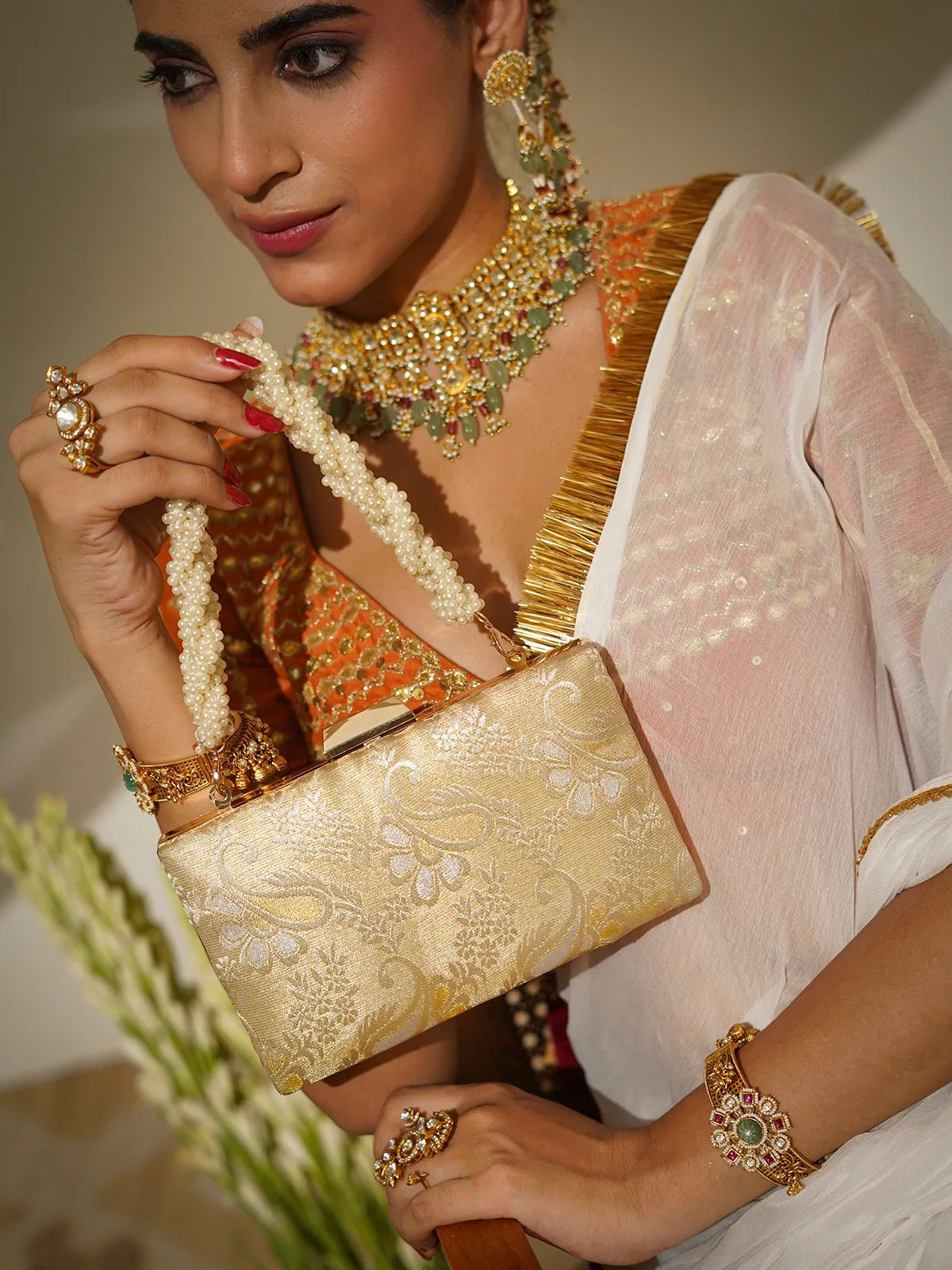 Vaanya Champagne Beige Clutch