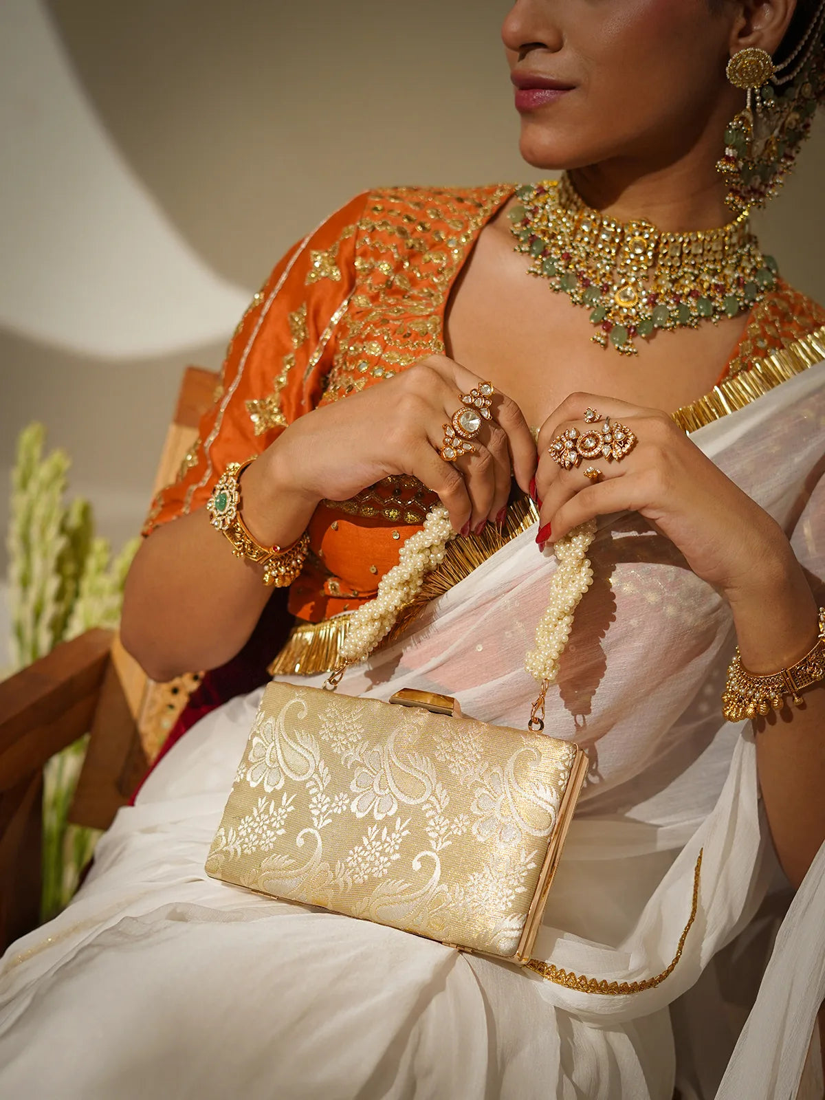 Vaanya Champagne Beige Clutch