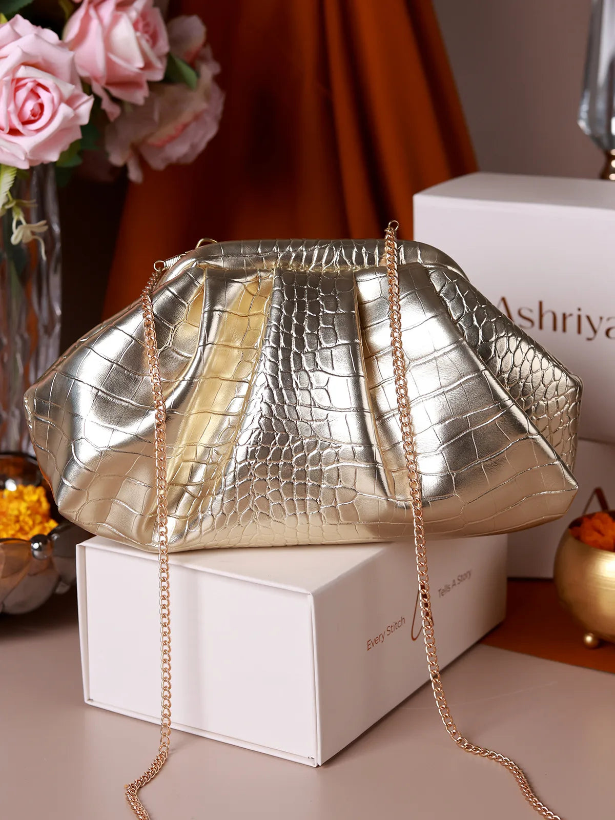 Yana Golden Batua Bag